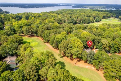 Welcome to this charming cottage nestled in the sought-after on Great Waters Course At Reynolds Plantation in Georgia - for sale on GolfHomes.com, golf home, golf lot