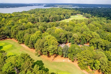 Welcome to this charming cottage nestled in the sought-after on Great Waters Course At Reynolds Plantation in Georgia - for sale on GolfHomes.com, golf home, golf lot