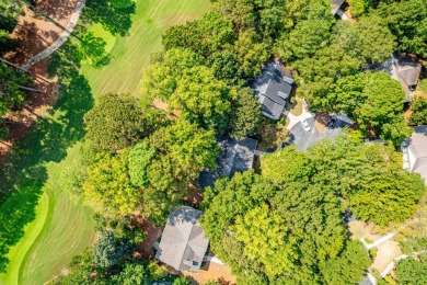 Welcome to this charming cottage nestled in the sought-after on Great Waters Course At Reynolds Plantation in Georgia - for sale on GolfHomes.com, golf home, golf lot