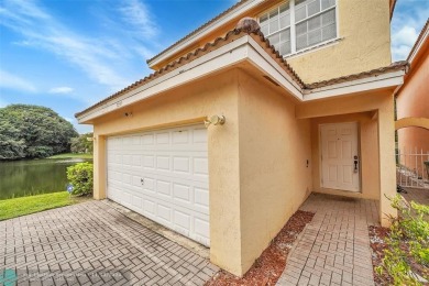 LARGE CORNER 3 BEDROOM 2.5 BATH HOME WITH LOFT  CAN BE 4TH on Inverrary Country Club in Florida - for sale on GolfHomes.com, golf home, golf lot