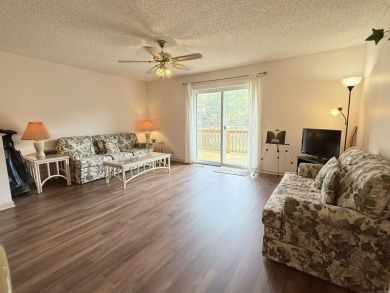 Discover lakeside living in this charming 2-bedroom, 1.5-bath on DeSoto Golf Course in Arkansas - for sale on GolfHomes.com, golf home, golf lot