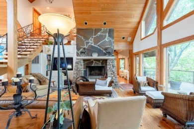 Nestled within the prestigious Tannenbaum Resort, this stunning on Tannenbaum Golf Club in Arkansas - for sale on GolfHomes.com, golf home, golf lot