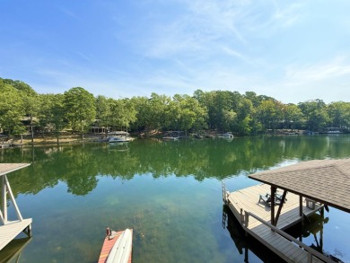 Discover lakeside living in this charming 2-bedroom, 1.5-bath on DeSoto Golf Course in Arkansas - for sale on GolfHomes.com, golf home, golf lot