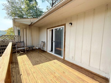 Discover lakeside living in this charming 2-bedroom, 1.5-bath on DeSoto Golf Course in Arkansas - for sale on GolfHomes.com, golf home, golf lot