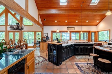 Nestled within the prestigious Tannenbaum Resort, this stunning on Tannenbaum Golf Club in Arkansas - for sale on GolfHomes.com, golf home, golf lot