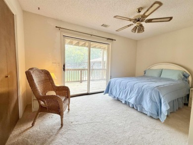 Discover lakeside living in this charming 2-bedroom, 1.5-bath on DeSoto Golf Course in Arkansas - for sale on GolfHomes.com, golf home, golf lot