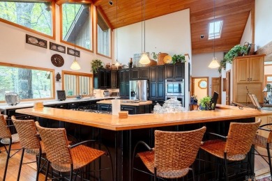Nestled within the prestigious Tannenbaum Resort, this stunning on Tannenbaum Golf Club in Arkansas - for sale on GolfHomes.com, golf home, golf lot