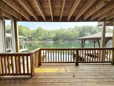 Discover lakeside living in this charming 2-bedroom, 1.5-bath on DeSoto Golf Course in Arkansas - for sale on GolfHomes.com, golf home, golf lot