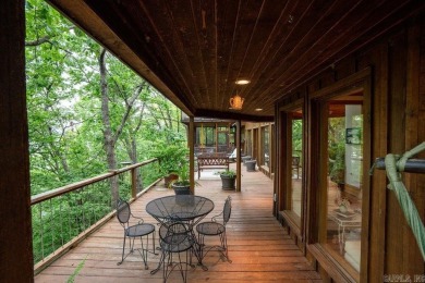 Nestled within the prestigious Tannenbaum Resort, this stunning on Tannenbaum Golf Club in Arkansas - for sale on GolfHomes.com, golf home, golf lot