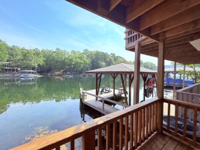Discover lakeside living in this charming 2-bedroom, 1.5-bath on DeSoto Golf Course in Arkansas - for sale on GolfHomes.com, golf home, golf lot