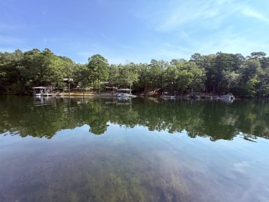 Discover lakeside living in this charming 2-bedroom, 1.5-bath on DeSoto Golf Course in Arkansas - for sale on GolfHomes.com, golf home, golf lot