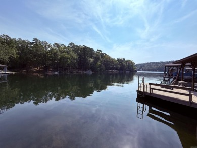 Discover lakeside living in this charming 2-bedroom, 1.5-bath on DeSoto Golf Course in Arkansas - for sale on GolfHomes.com, golf home, golf lot