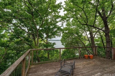Nestled within the prestigious Tannenbaum Resort, this stunning on Tannenbaum Golf Club in Arkansas - for sale on GolfHomes.com, golf home, golf lot