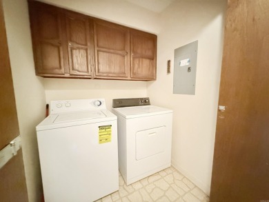 Discover lakeside living in this charming 2-bedroom, 1.5-bath on DeSoto Golf Course in Arkansas - for sale on GolfHomes.com, golf home, golf lot