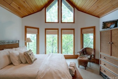 Nestled within the prestigious Tannenbaum Resort, this stunning on Tannenbaum Golf Club in Arkansas - for sale on GolfHomes.com, golf home, golf lot