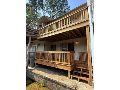 Discover lakeside living in this charming 2-bedroom, 1.5-bath on DeSoto Golf Course in Arkansas - for sale on GolfHomes.com, golf home, golf lot