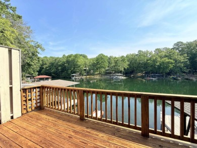 Discover lakeside living in this charming 2-bedroom, 1.5-bath on DeSoto Golf Course in Arkansas - for sale on GolfHomes.com, golf home, golf lot