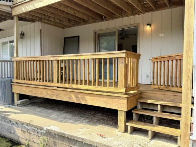 Discover lakeside living in this charming 2-bedroom, 1.5-bath on DeSoto Golf Course in Arkansas - for sale on GolfHomes.com, golf home, golf lot