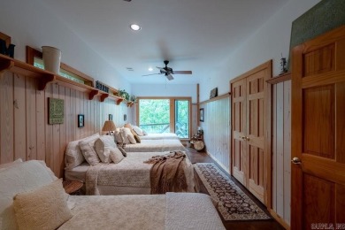 Nestled within the prestigious Tannenbaum Resort, this stunning on Tannenbaum Golf Club in Arkansas - for sale on GolfHomes.com, golf home, golf lot