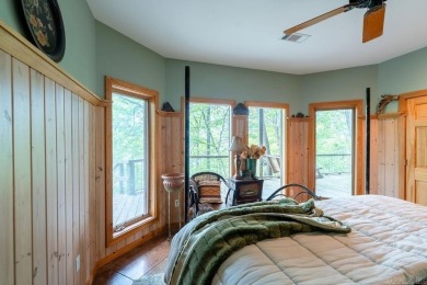 Nestled within the prestigious Tannenbaum Resort, this stunning on Tannenbaum Golf Club in Arkansas - for sale on GolfHomes.com, golf home, golf lot