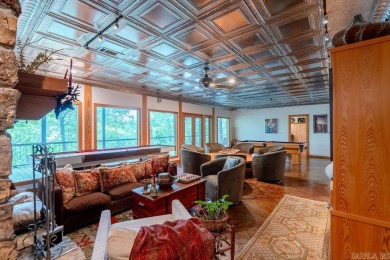 Nestled within the prestigious Tannenbaum Resort, this stunning on Tannenbaum Golf Club in Arkansas - for sale on GolfHomes.com, golf home, golf lot