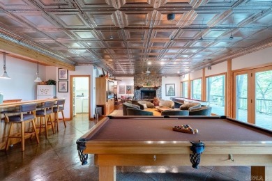 Nestled within the prestigious Tannenbaum Resort, this stunning on Tannenbaum Golf Club in Arkansas - for sale on GolfHomes.com, golf home, golf lot