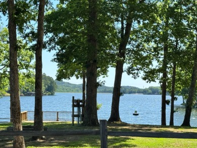 Discover lakeside living in this charming 2-bedroom, 1.5-bath on DeSoto Golf Course in Arkansas - for sale on GolfHomes.com, golf home, golf lot