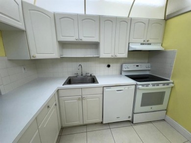 2/2 CONDOMINIUM FOR SALE IN DESIRABLE VERY ACTIVE COMMUNITY AT on Oriole Golf and Tennis Club in Florida - for sale on GolfHomes.com, golf home, golf lot