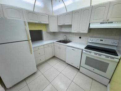2/2 CONDOMINIUM FOR SALE IN DESIRABLE VERY ACTIVE COMMUNITY AT on Oriole Golf and Tennis Club in Florida - for sale on GolfHomes.com, golf home, golf lot