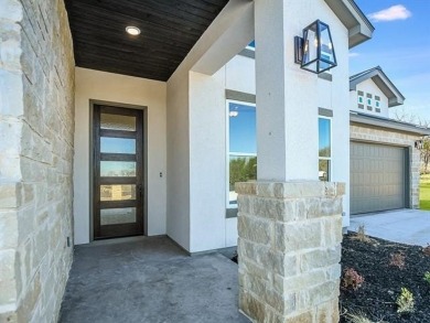 This beautiful new construction by Everview Homes in Horseshoe on Slick Rock Golf Course - Horseshoe Bay in Texas - for sale on GolfHomes.com, golf home, golf lot