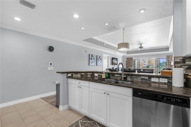 Under contract-accepting backup offers. Tastefully updated on Reunion Resort Golf Course in Florida - for sale on GolfHomes.com, golf home, golf lot