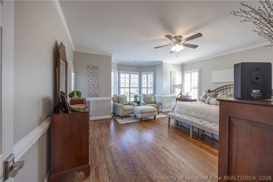 This beautifully updated custom brick home is located on Hole #1 on Sandy Ridge Country Club in North Carolina - for sale on GolfHomes.com, golf home, golf lot