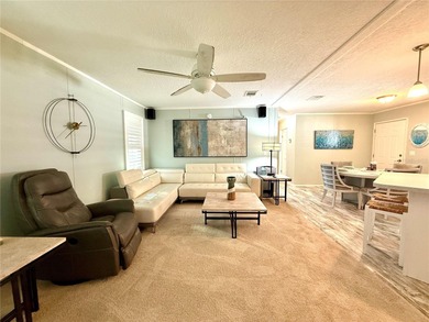 Located in the sought-after Caribbean Isles, this beautifully on Apollo Beach Golf and Sea Club in Florida - for sale on GolfHomes.com, golf home, golf lot