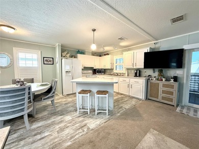 Located in the sought-after Caribbean Isles, this beautifully on Apollo Beach Golf and Sea Club in Florida - for sale on GolfHomes.com, golf home, golf lot