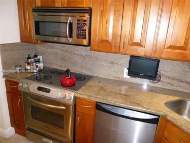 Live the Aventura lifestyle! Spacious condo in the heart of one on Turnberry Isle Resort and Club in Florida - for sale on GolfHomes.com, golf home, golf lot