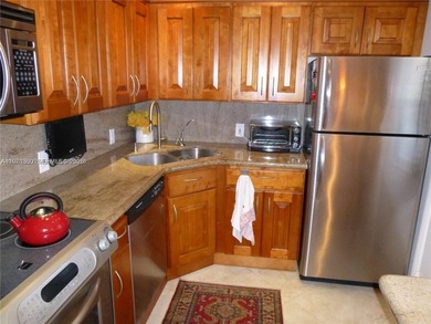 Live the Aventura lifestyle! Spacious condo in the heart of one on Turnberry Isle Resort and Club in Florida - for sale on GolfHomes.com, golf home, golf lot