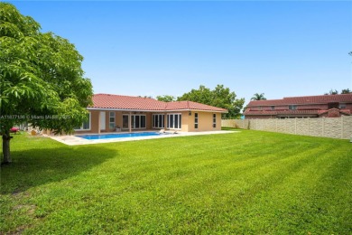 Rarely available 5-bed, 3.5-bath home on an oversized lot with on  in Florida - for sale on GolfHomes.com, golf home, golf lot