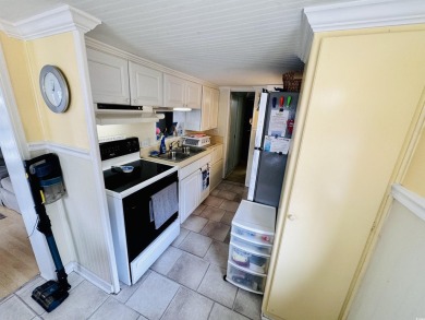 2 BED/1.5 BATH BEACH HOUSE WITH WRAPAROUND COMPOSITE DECKING on Prestwick Country Club in South Carolina - for sale on GolfHomes.com, golf home, golf lot