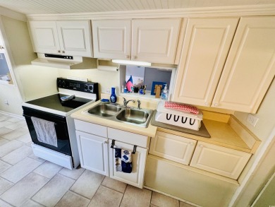 2 BED/1.5 BATH BEACH HOUSE WITH WRAPAROUND COMPOSITE DECKING on Prestwick Country Club in South Carolina - for sale on GolfHomes.com, golf home, golf lot