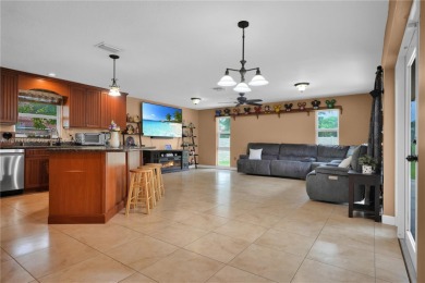 Rarely available 5-bed, 3.5-bath home on an oversized lot with on  in Florida - for sale on GolfHomes.com, golf home, golf lot