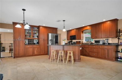 Rarely available 5-bed, 3.5-bath home on an oversized lot with on  in Florida - for sale on GolfHomes.com, golf home, golf lot