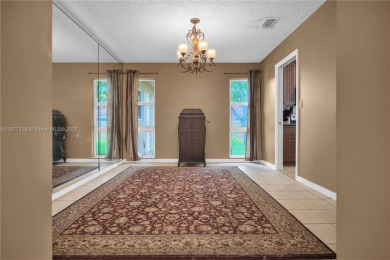Rarely available 5-bed, 3.5-bath home on an oversized lot with on  in Florida - for sale on GolfHomes.com, golf home, golf lot