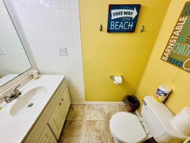 2 BED/1.5 BATH BEACH HOUSE WITH WRAPAROUND COMPOSITE DECKING on Prestwick Country Club in South Carolina - for sale on GolfHomes.com, golf home, golf lot