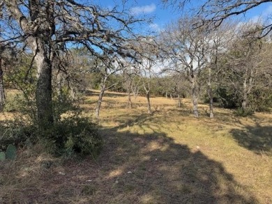 Wonderful acre homesite that backs to the wet weather creek with on Ram Rock Golf Course in Texas - for sale on GolfHomes.com, golf home, golf lot