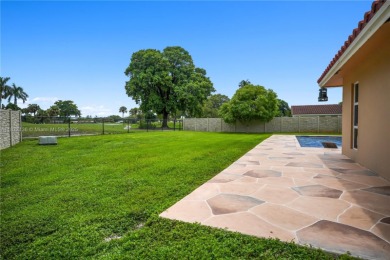 Rarely available 5-bed, 3.5-bath home on an oversized lot with on  in Florida - for sale on GolfHomes.com, golf home, golf lot
