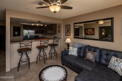 Desirable View Condo at Queensbay! This stunning lake-view condo on London Bridge Golf Course in Arizona - for sale on GolfHomes.com, golf home, golf lot