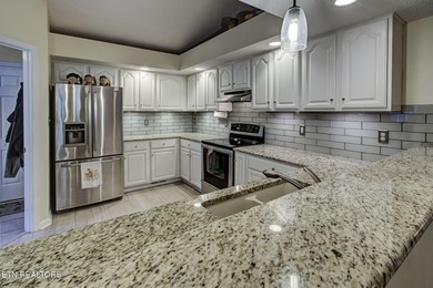 Welcome home to this beautifully maintained residence where on Tanasi Golf Course in Tennessee - for sale on GolfHomes.com, golf home, golf lot