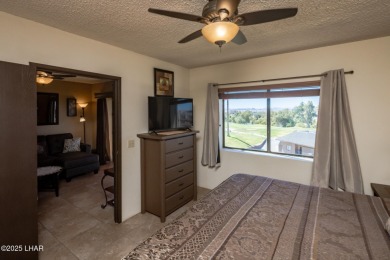 Desirable View Condo at Queensbay! This stunning lake-view condo on London Bridge Golf Course in Arizona - for sale on GolfHomes.com, golf home, golf lot