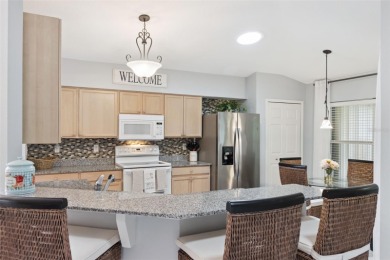 Welcome to the carefree Florida lifestyle in the exclusive 55+ on Tampa Bay Golf and Country Club in Florida - for sale on GolfHomes.com, golf home, golf lot