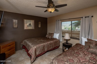 Desirable View Condo at Queensbay! This stunning lake-view condo on London Bridge Golf Course in Arizona - for sale on GolfHomes.com, golf home, golf lot